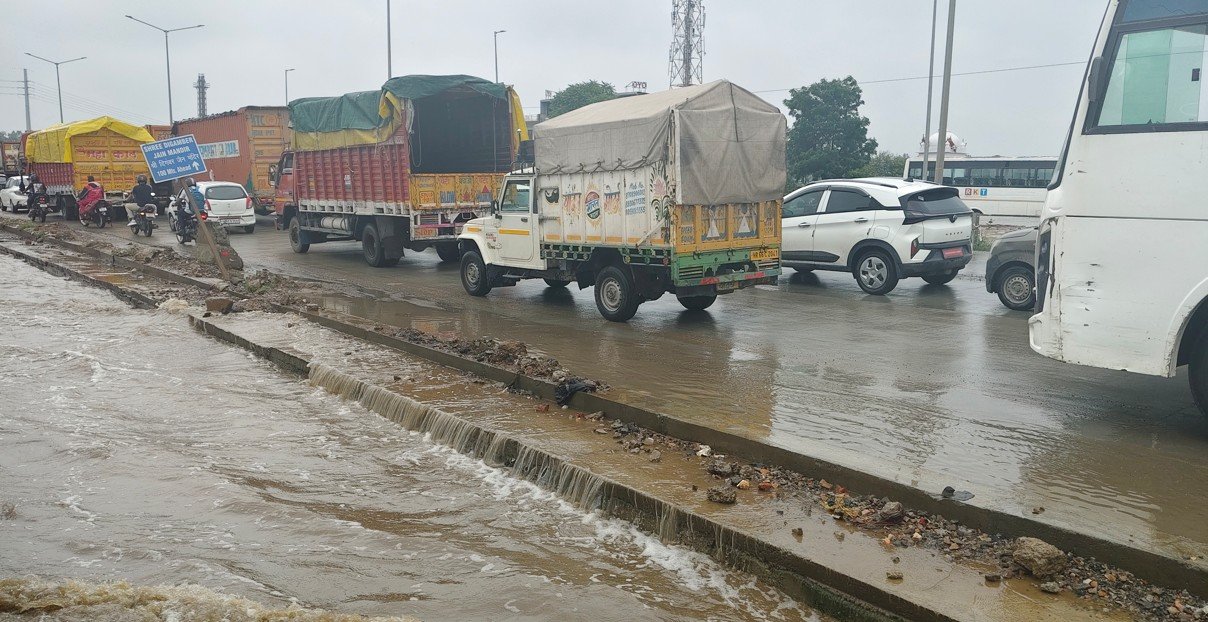 NH 48 drainage issues exposed again: Waterlogging and traffic jams follow rainfall.